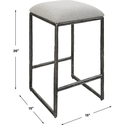 Brisbane Counter Stool by Uttermost in ivory, gray and charcoal. Made from cast iron, mdf, foam, fabric in a modern style.