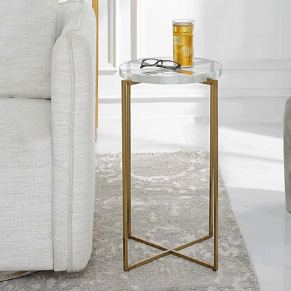 Star-Crossed Accent Table by Uttermost in gold. Made from seeded thick glass, stainless steel in a modern style.