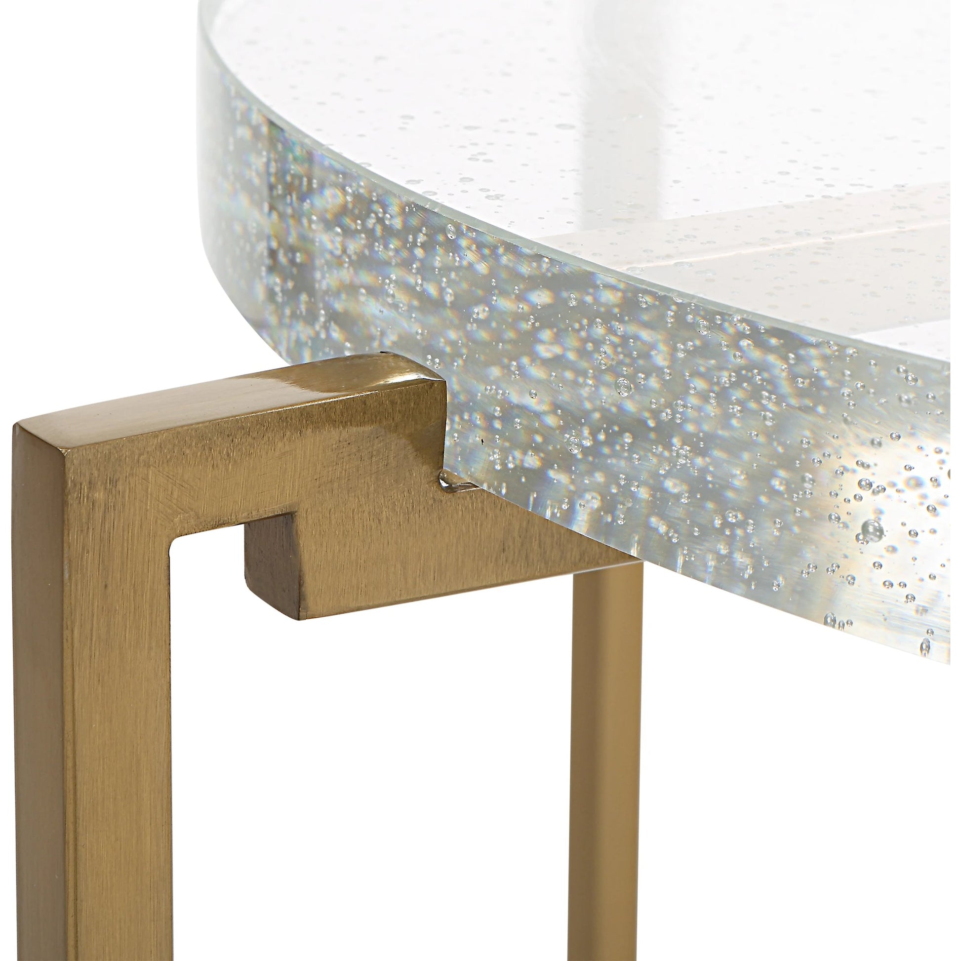 Star-Crossed Accent Table by Uttermost in gold. Made from seeded thick glass, stainless steel in a modern style.