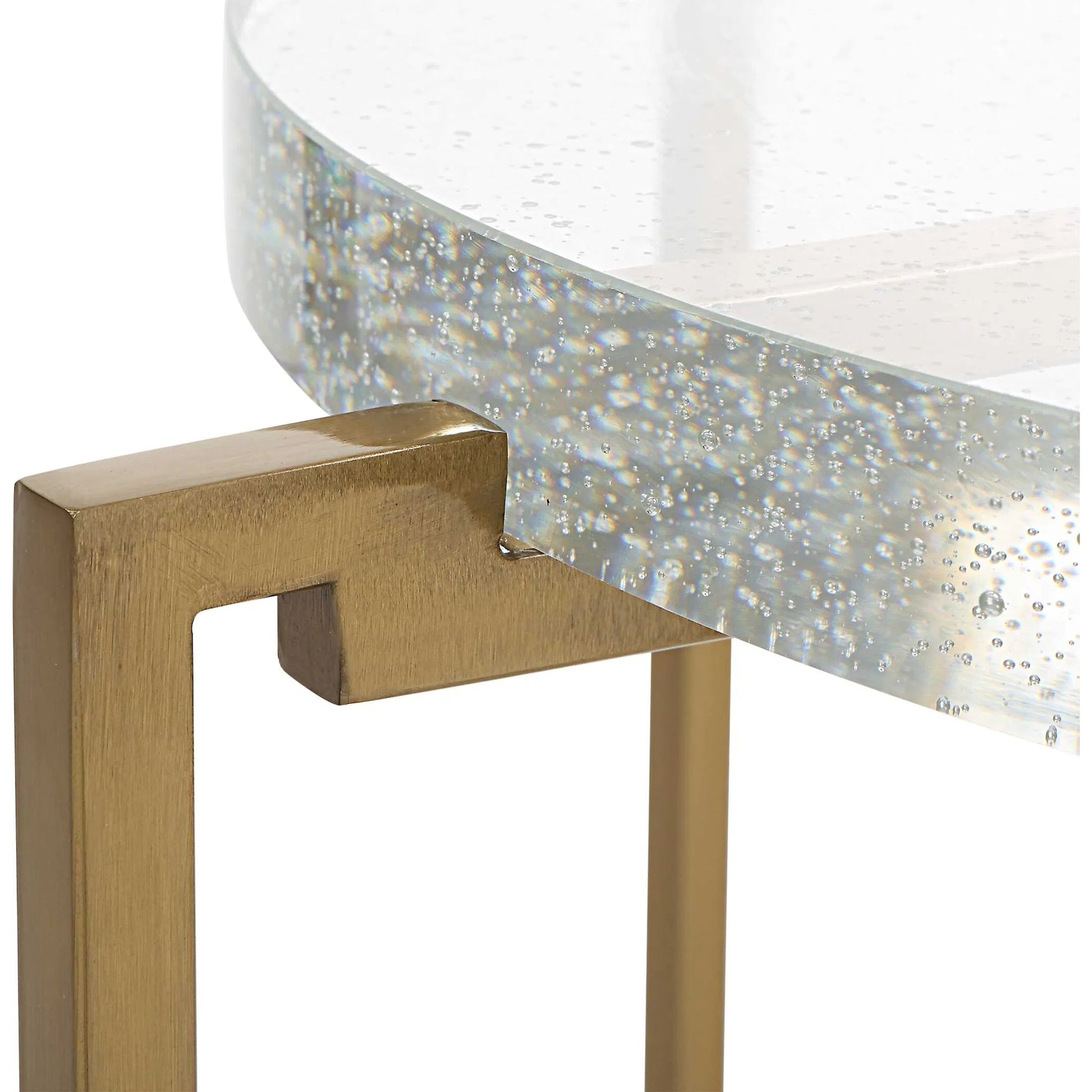 Star-Crossed Accent Table by Uttermost in gold. Made from seeded thick glass, stainless steel in a modern style.