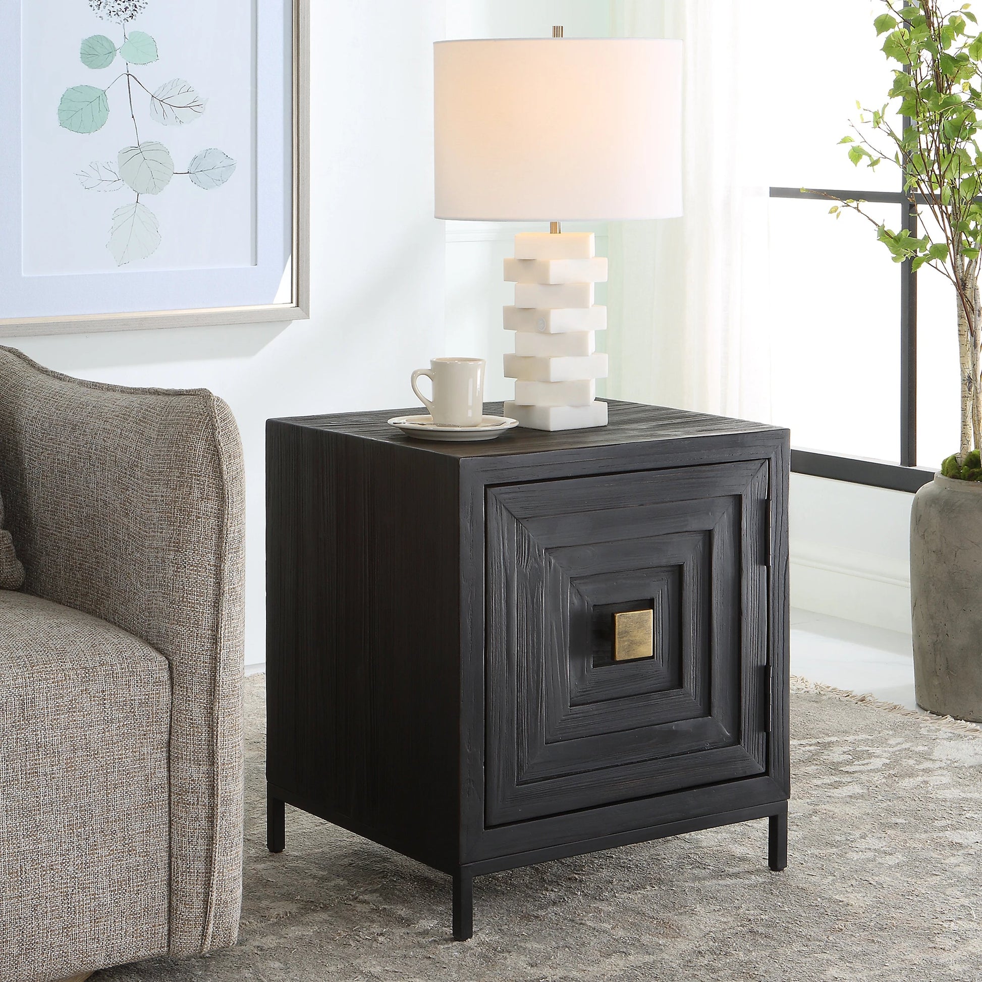 Aiken Cabinet by Uttermost in dark ebony. Made from fir, wood, steel in a transitional style.