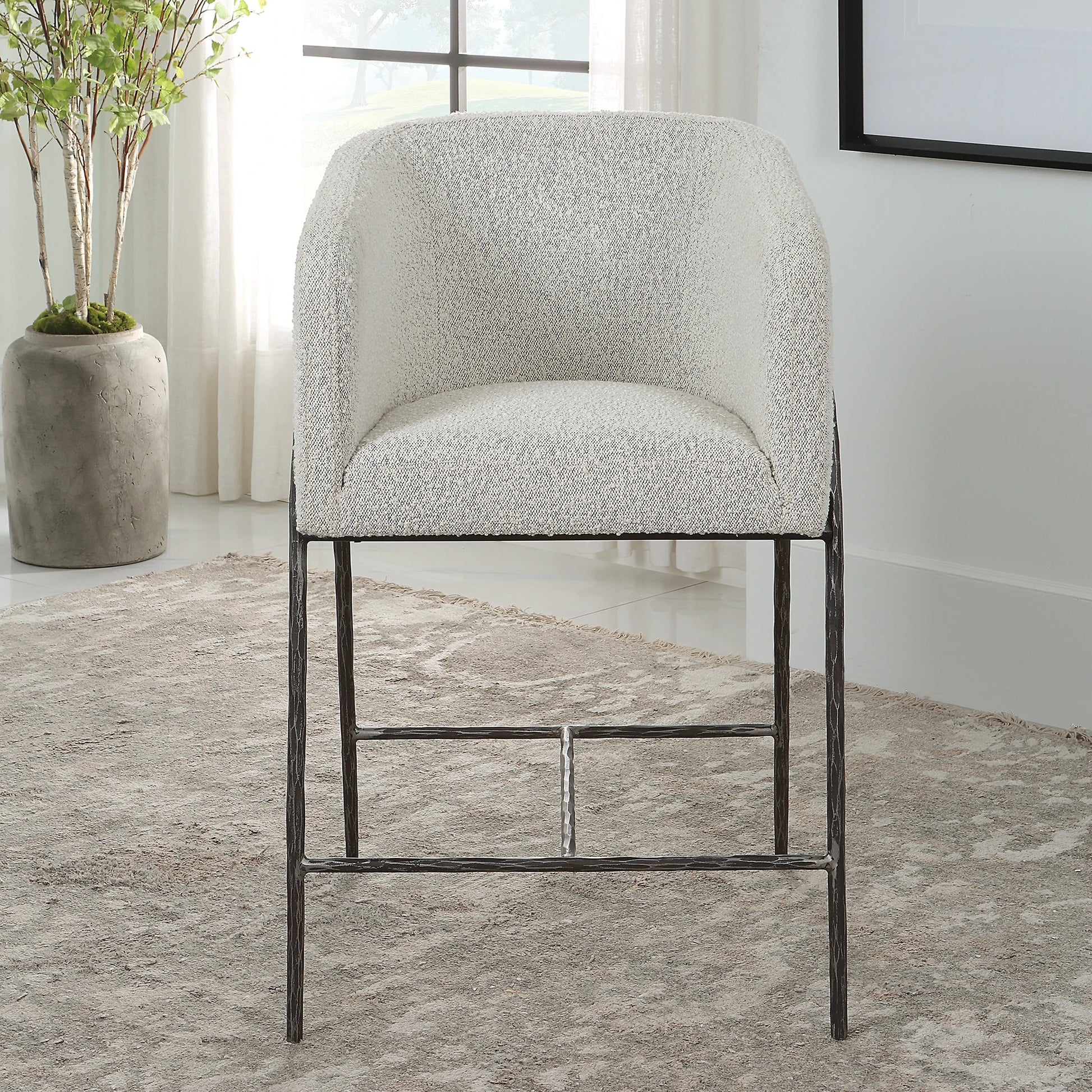 Jacobsen Counter Stool by Uttermost in ivory, warm gray and iron. Made from steel, foam, fabric, eucalyptus in a modern style.