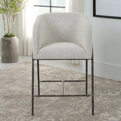 Jacobsen Counter Stool by Uttermost in ivory, warm gray and iron. Made from steel, foam, fabric, eucalyptus in a modern style.