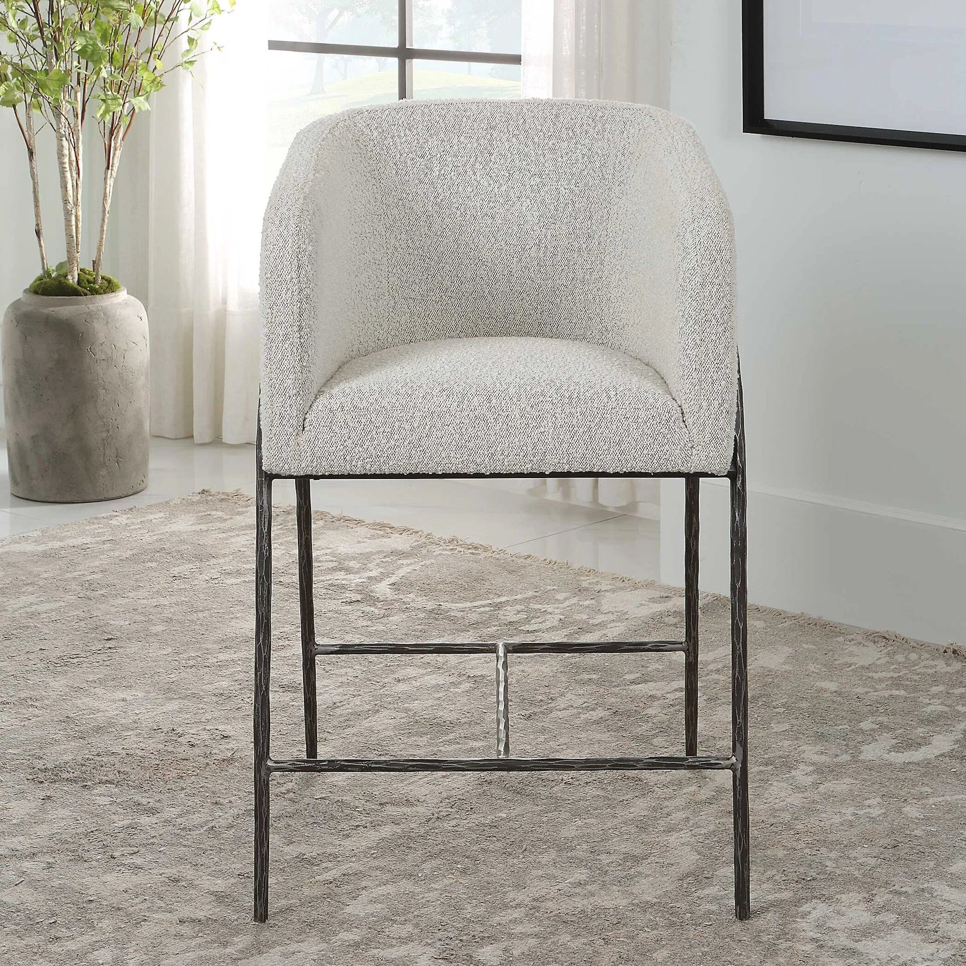 Jacobsen Counter Stool by Uttermost in ivory, warm gray and iron. Made from steel, foam, fabric, eucalyptus in a modern style.