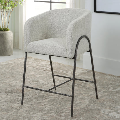 Jacobsen Counter Stool by Uttermost in ivory, warm gray and iron. Made from steel, foam, fabric, eucalyptus in a modern style.