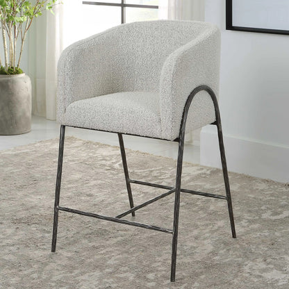 Jacobsen Counter Stool by Uttermost in ivory, warm gray and iron. Made from steel, foam, fabric, eucalyptus in a modern style.