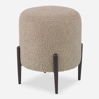 Arles Ottoman by Uttermost in white and satin black. Made from hardwood, plywood, fabric, foam in a transitional style.