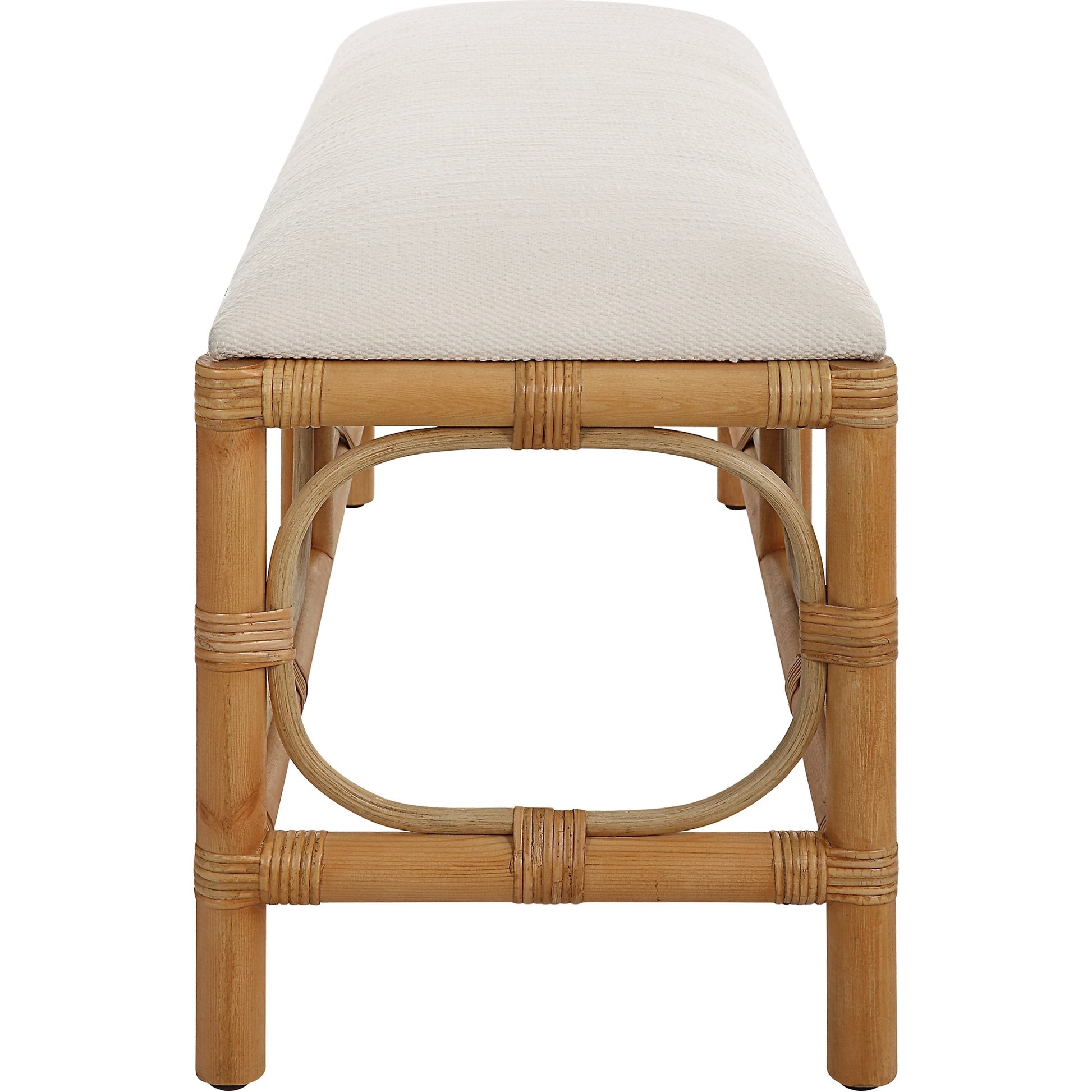 Laguna Bench by Uttermost in white. Made from mdf, pine, rattan, polyester, foam in a coastal style.