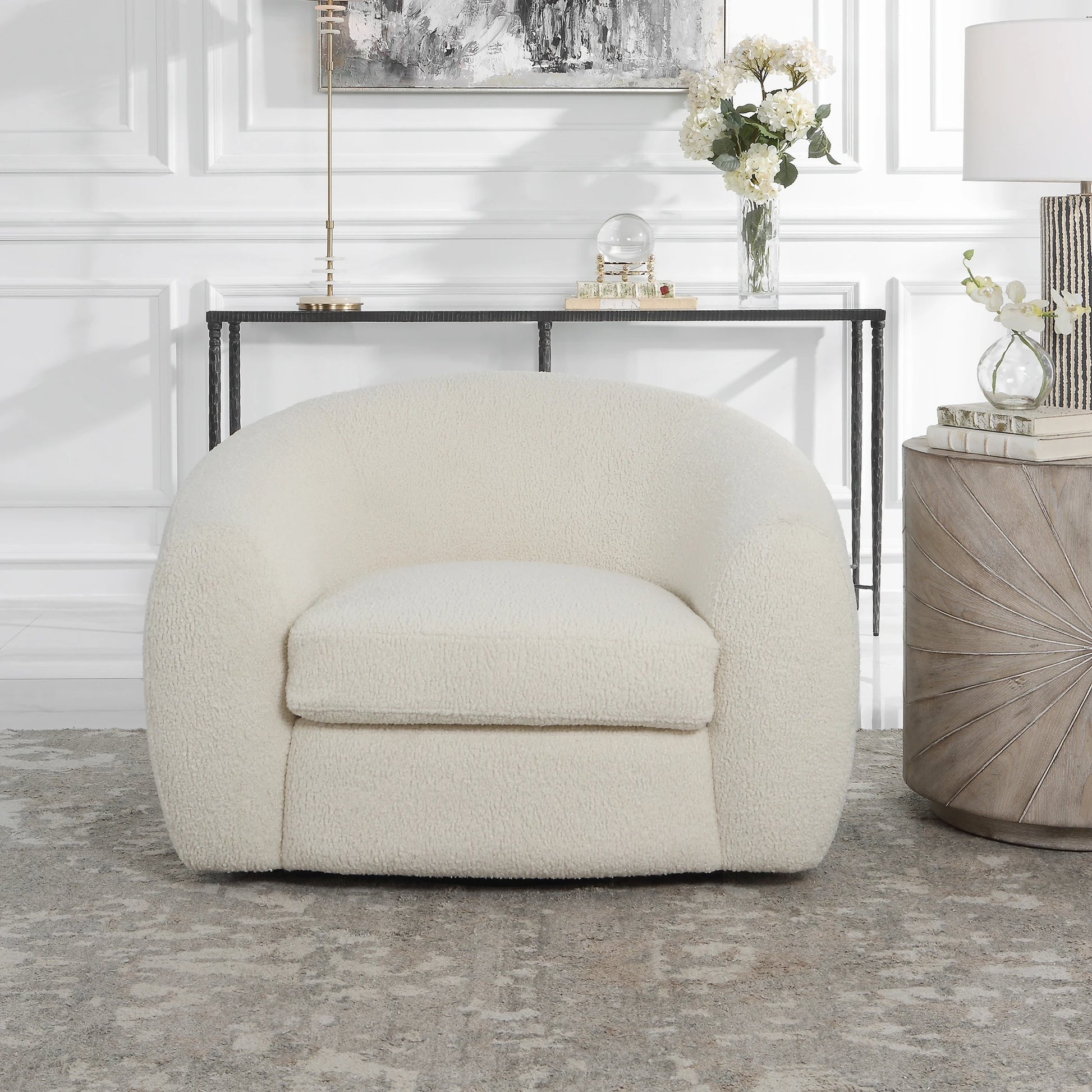Capra Swivel Chair by Uttermost in multi. Made from fabric, foam, plywood, stainless steel in a modern style.