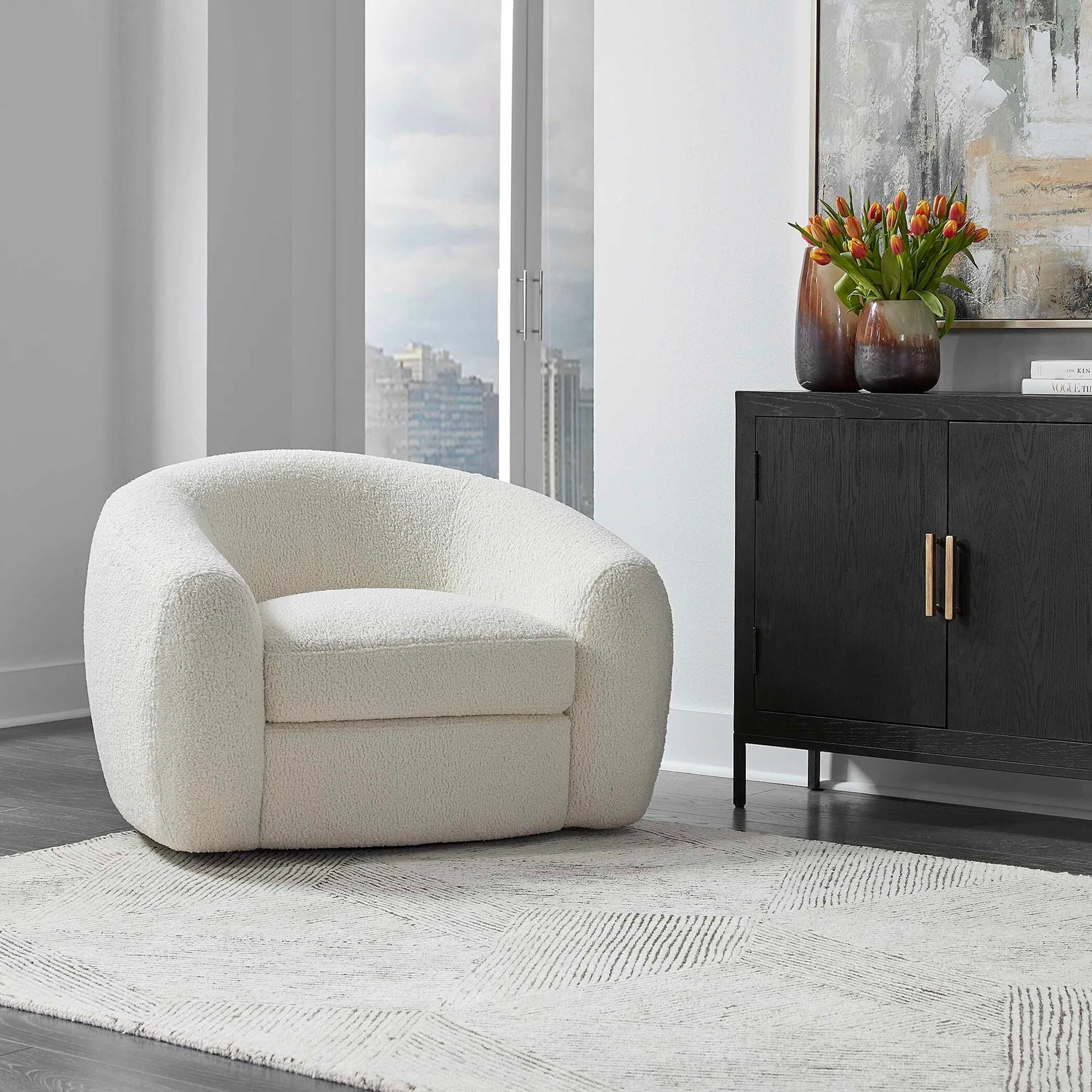 Capra Swivel Chair by Uttermost in multi. Made from fabric, foam, plywood, stainless steel in a modern style.