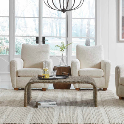 Calabria Coffee Table by Uttermost in woven seagrass. Made from woven seagrass, mango wood, metal in a coastal style.