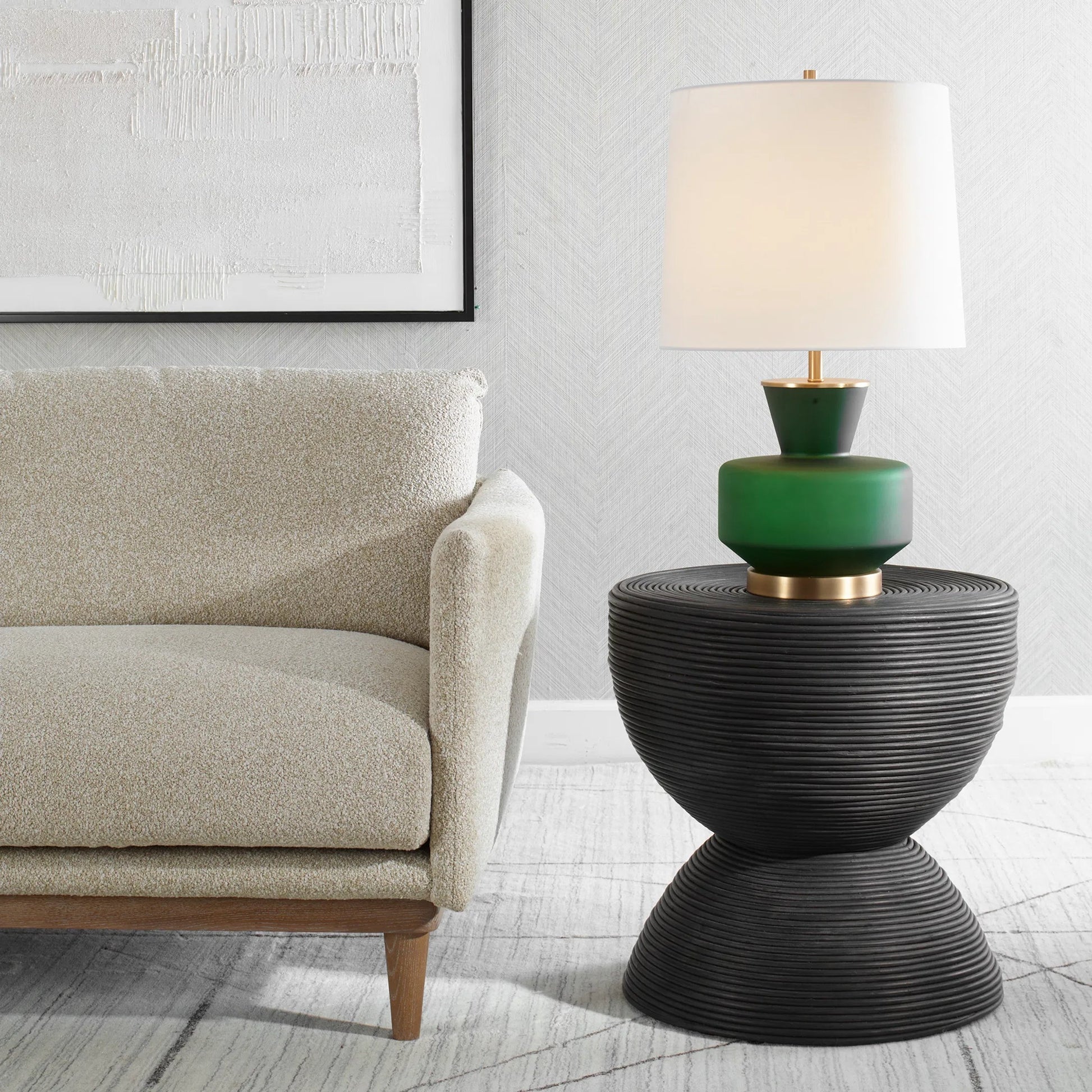 Bongo Side Table by Uttermost in black. Made from rattan in a modern style.