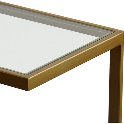 Musing Accent Table by Uttermost in brushed brass. Made from iron, glass in a modern style.