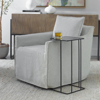 Cadmus Accent Table by Uttermost in black. Made from iron, glass in a modern style.