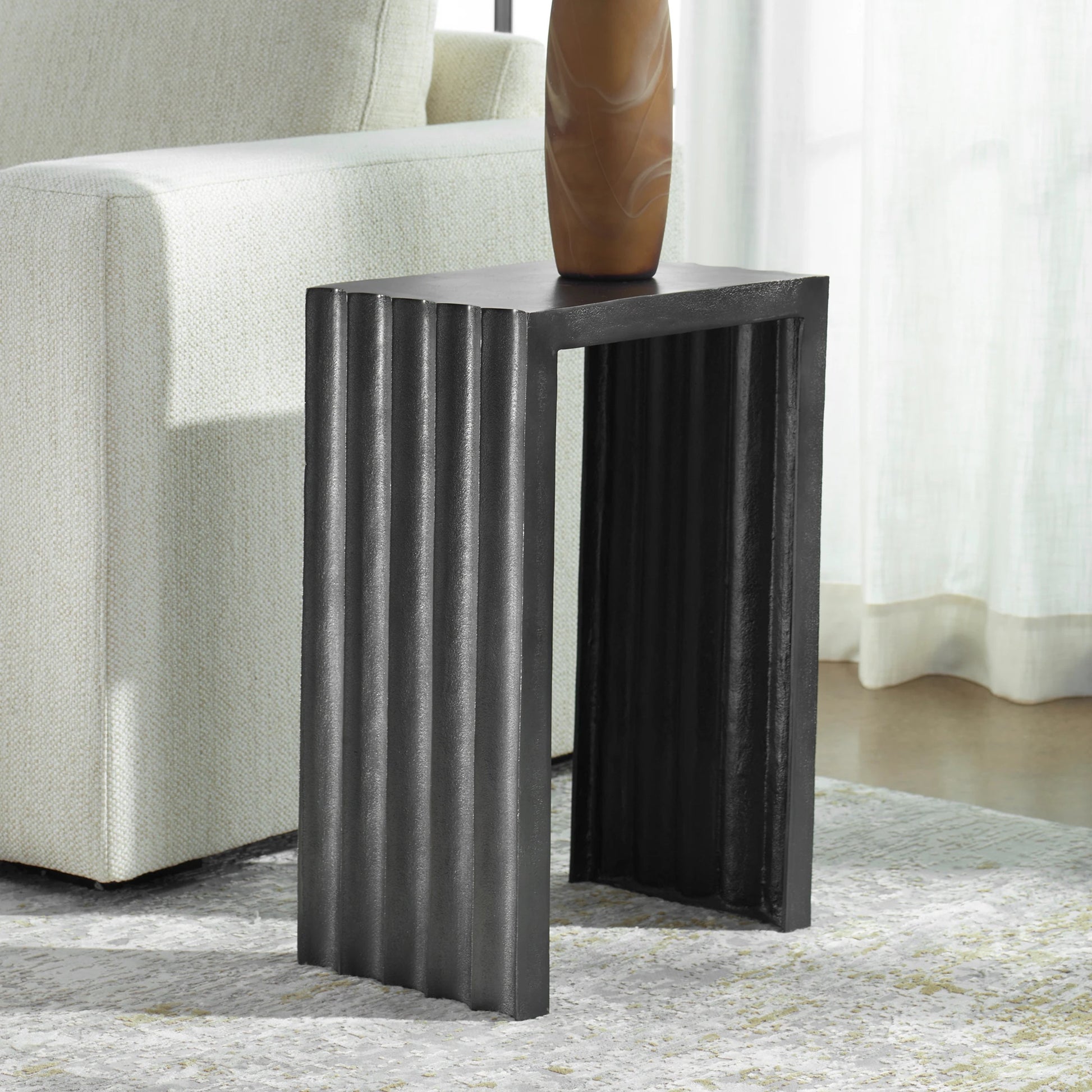 In the Groove Accent Table by Uttermost in nickel. Made from aluminum in a modern style.
