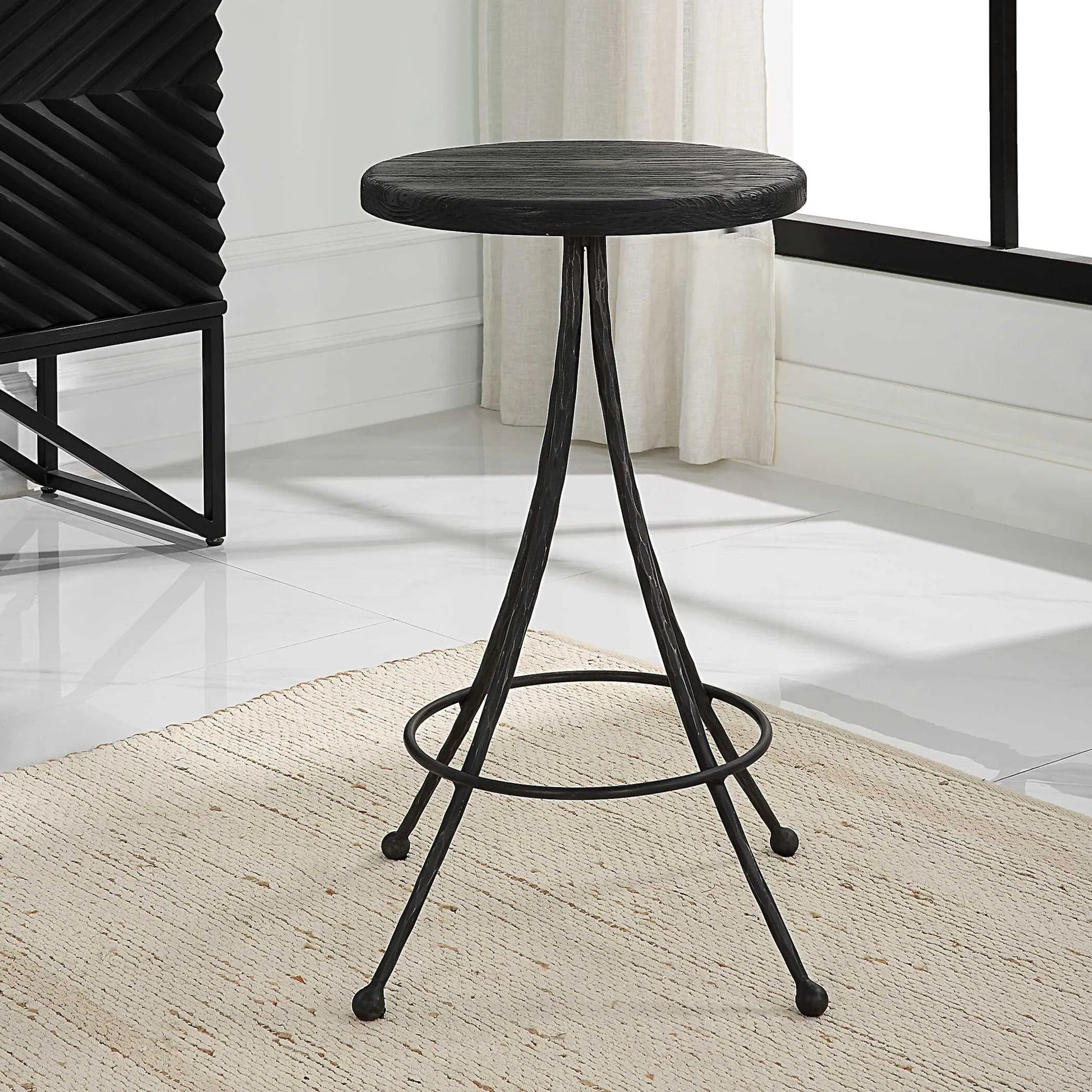 Sona Counter Stool by Uttermost in black. Made from recycled pine, iron in a modern style.