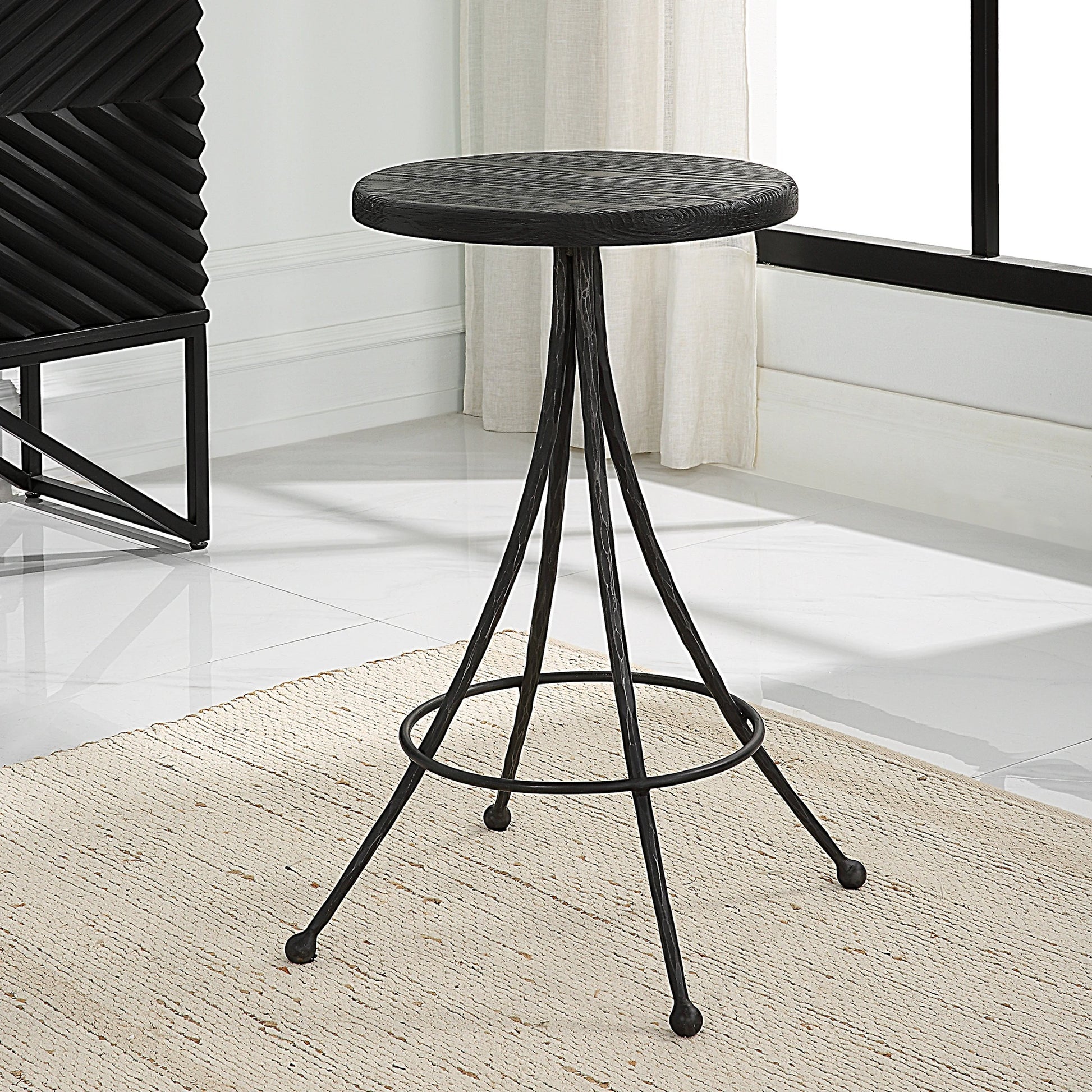 Sona Counter Stool by Uttermost in black. Made from recycled pine, iron in a modern style.