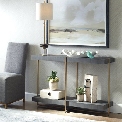 Taja Console Table by Uttermost in dark walnut. Made from mdf, veneer, stainless steel in a modern style.