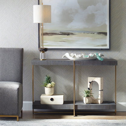 Taja Console Table by Uttermost in dark walnut. Made from mdf, veneer, stainless steel in a modern style.