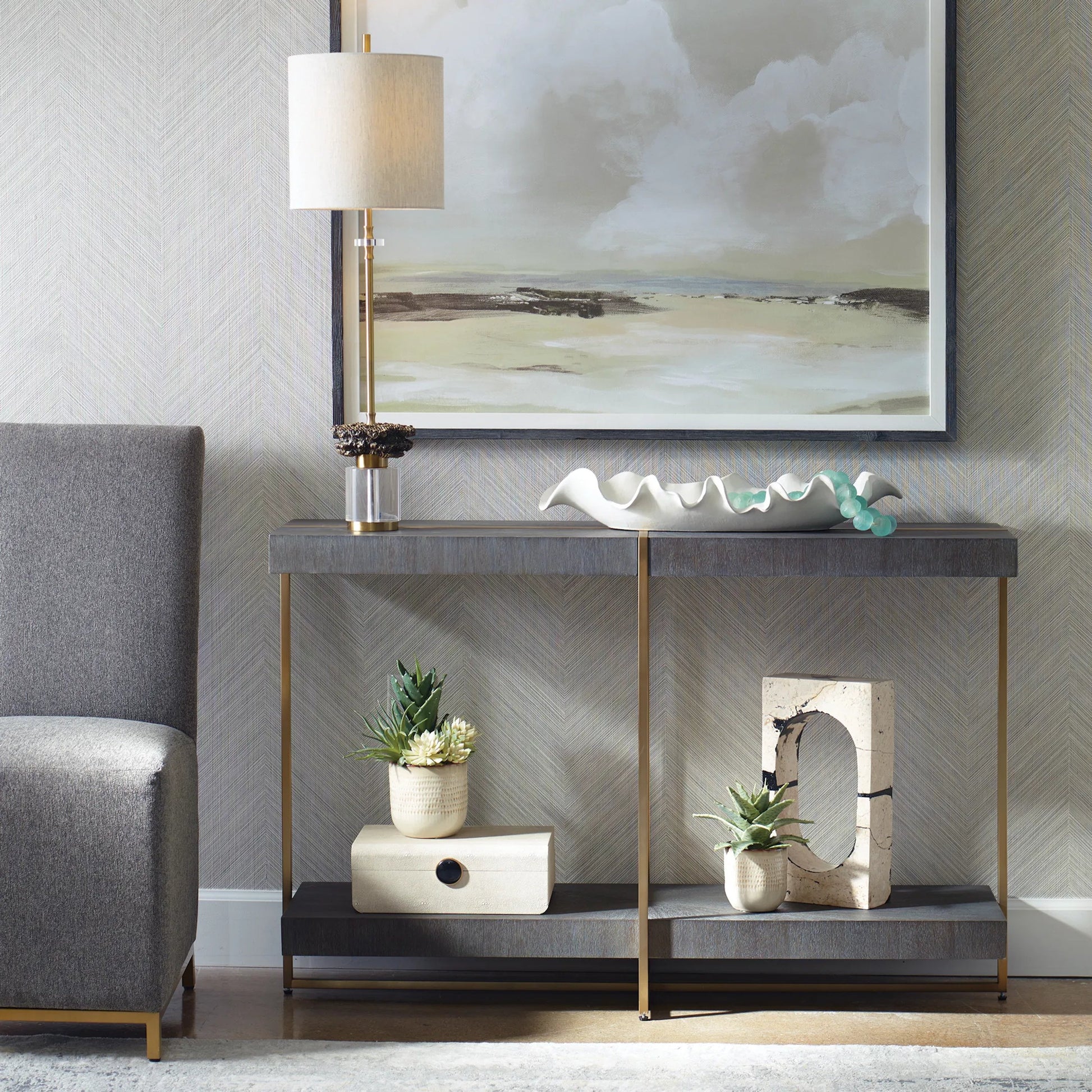 Taja Console Table by Uttermost in dark walnut. Made from mdf, veneer, stainless steel in a modern style.
