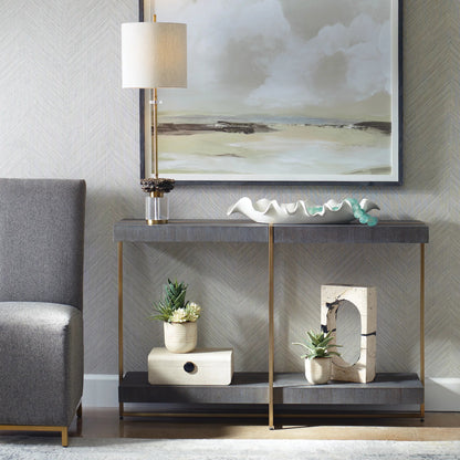 Taja Console Table by Uttermost in dark walnut. Made from mdf, veneer, stainless steel in a modern style.