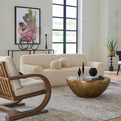 Abide Rounded Sheepskin Sofa by Uttermost in caramel. Made from oak, foam, fabric, plywood in a modern style.