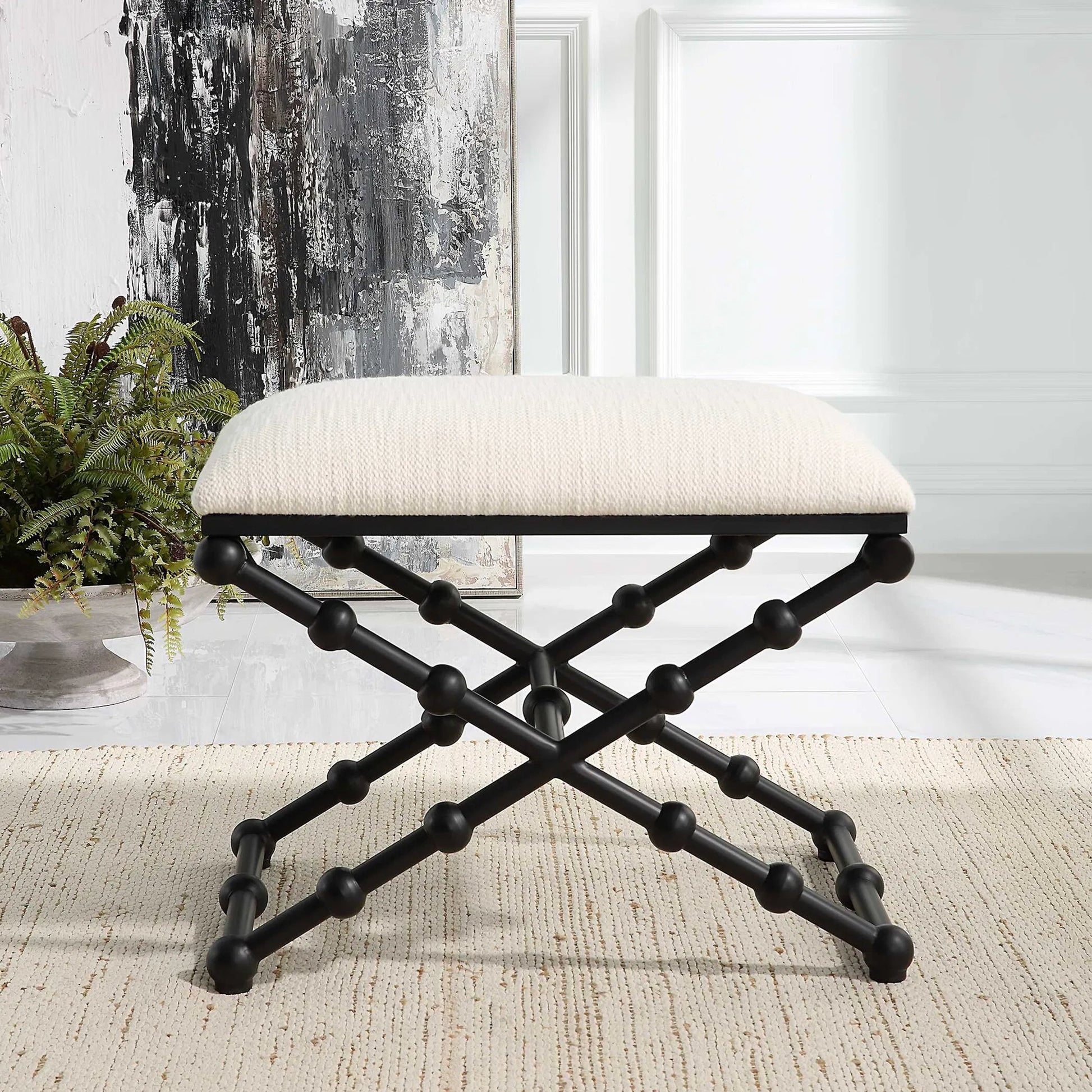 Drops Bench by Uttermost in iron. Made from iron, mdf, polyester, foam in a modern style.