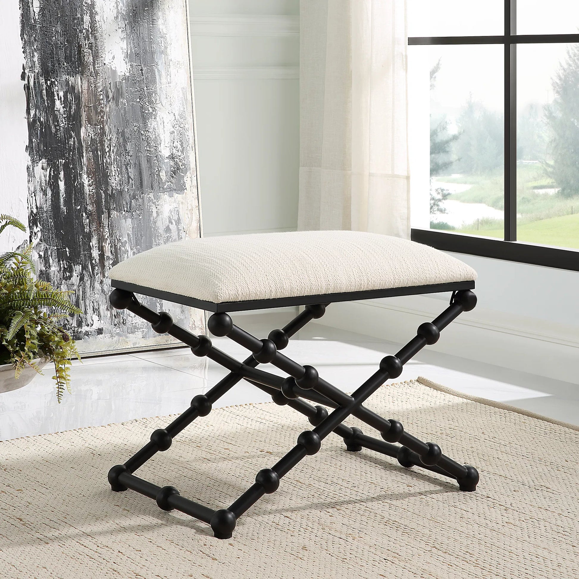 Drops Bench by Uttermost in iron. Made from iron, mdf, polyester, foam in a modern style.