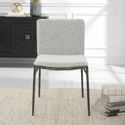 Jacobsen Dining Chair by Uttermost in ivory, warm gray and aged black. Made from iron, fabric, foam, plywood in a modern style.
