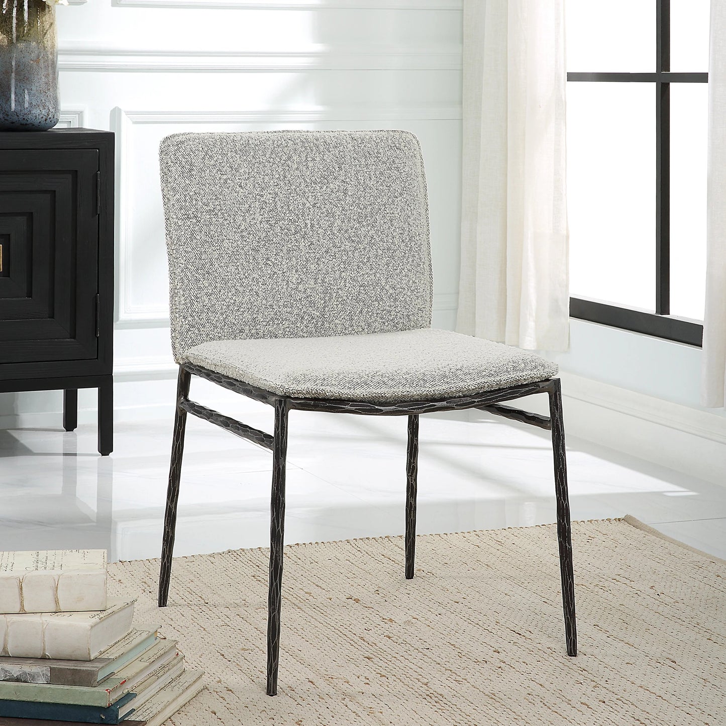 008 SI-2146862 | Lifestyle | Jacobsen Dining Chair by Uttermost in ivory, warm gray and aged black. Made from iron, fabric, foam, plywood in a modern style.