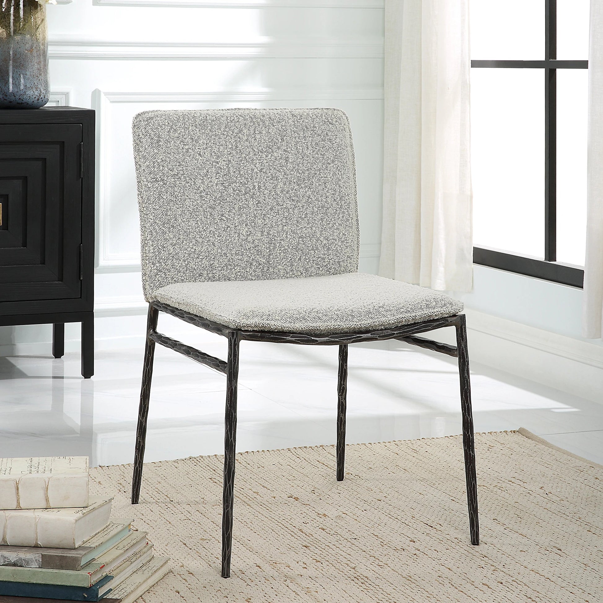 Jacobsen Dining Chair by Uttermost in ivory, warm gray and aged black. Made from iron, fabric, foam, plywood in a modern style.