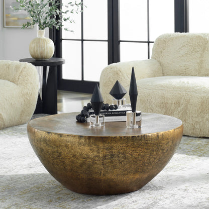 Gilded Dome Coffee Table by Uttermost in gold. Made from aluminum in a unique style.
