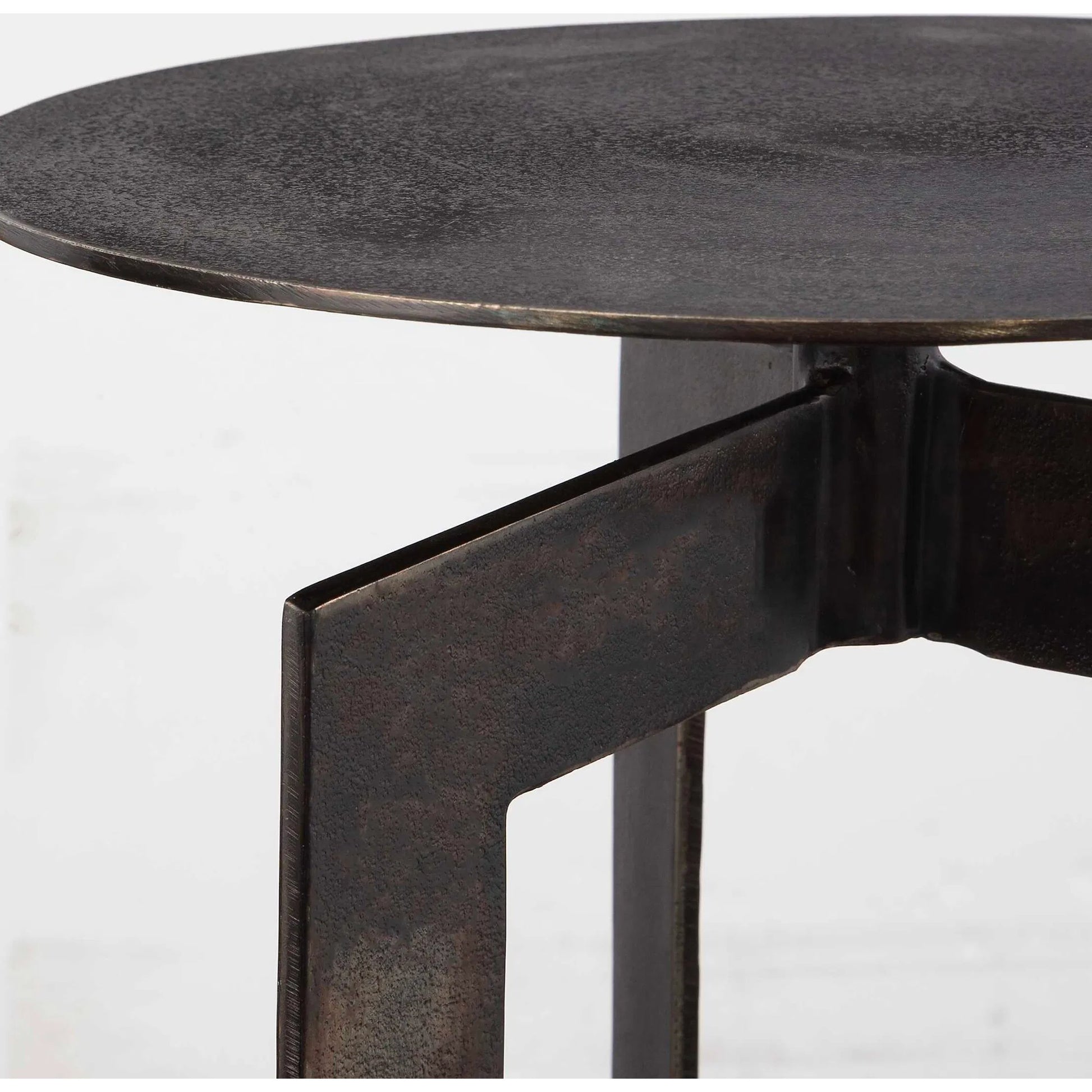Deltoid Gunmetal Accent Table by Uttermost in bronze. Made from aluminum in a modern style.