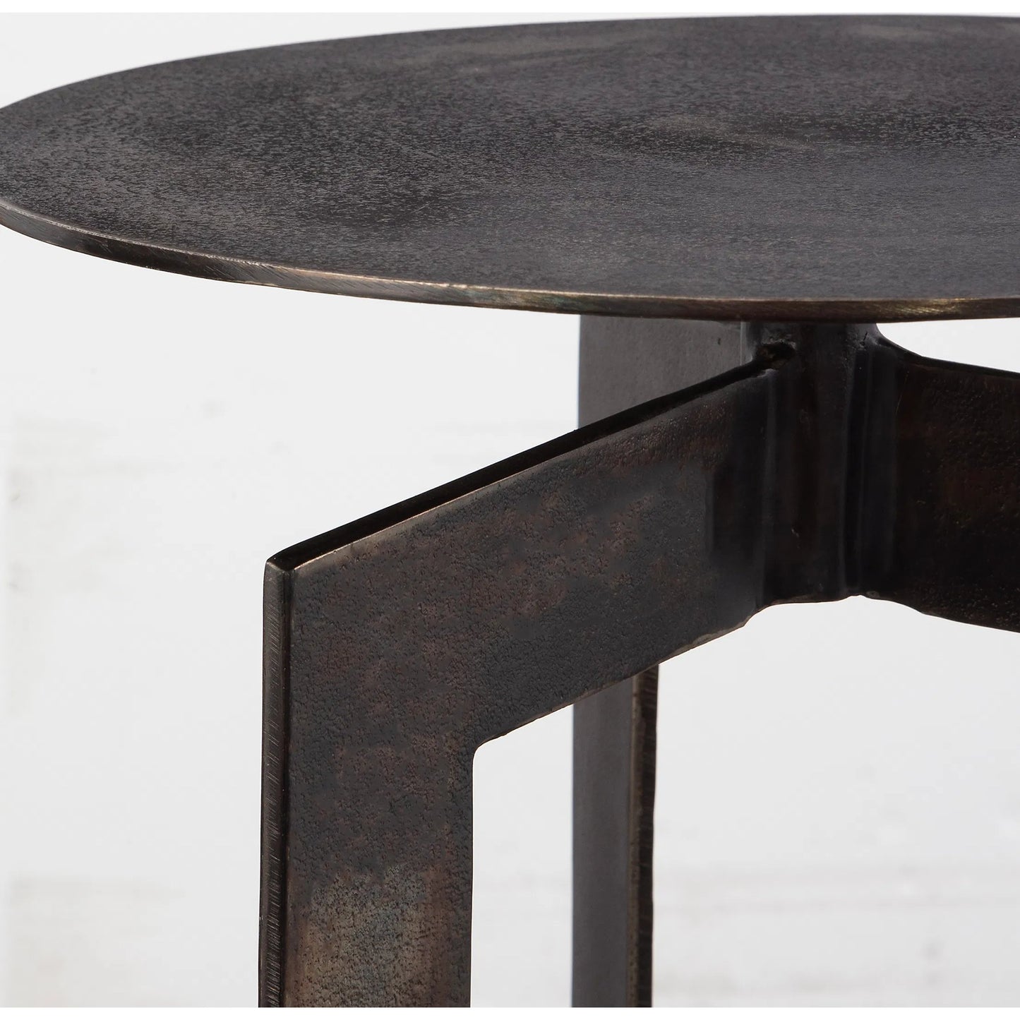 003 SI-2262233 | Unknown | Deltoid Gunmetal Accent Table by Uttermost in bronze. Made from aluminum in a unique style.