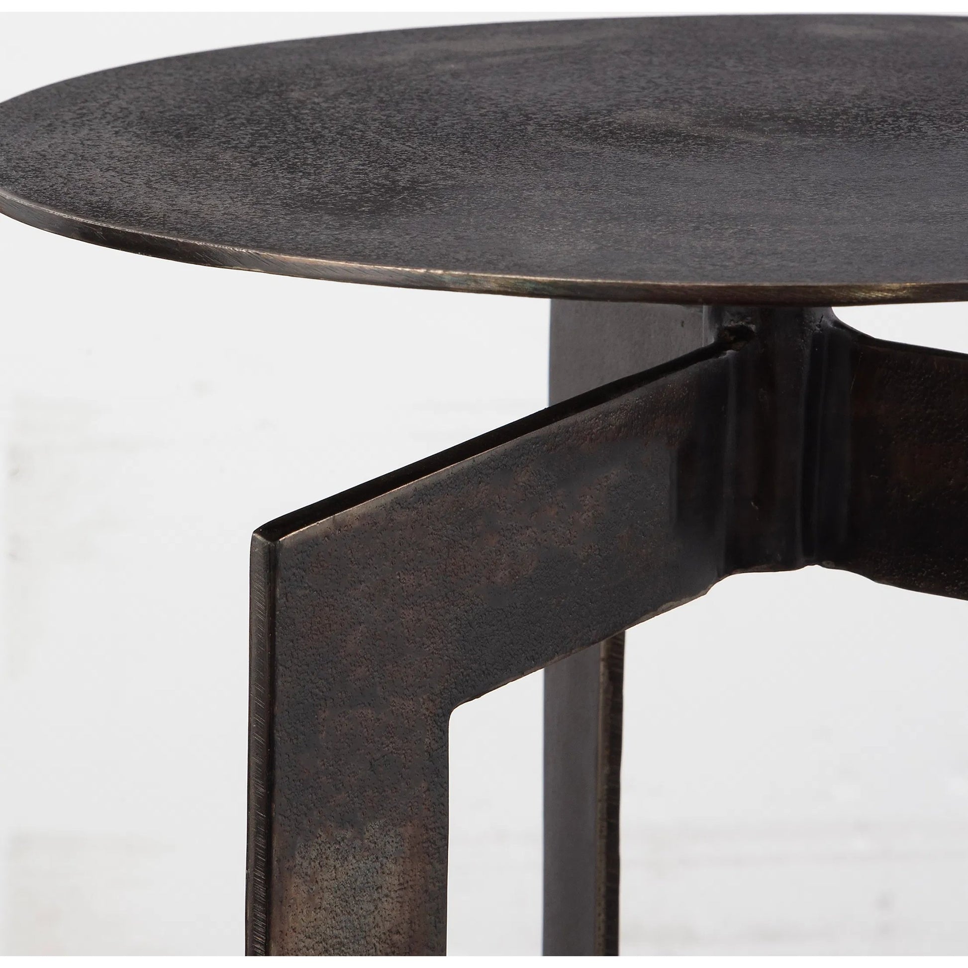 Deltoid Gunmetal Accent Table by Uttermost in bronze. Made from aluminum in a unique style.