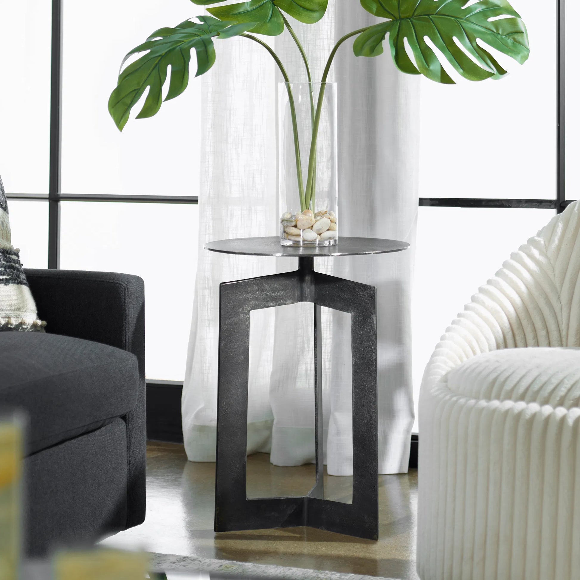 Deltoid Gunmetal Accent Table by Uttermost in bronze. Made from aluminum in a unique style.