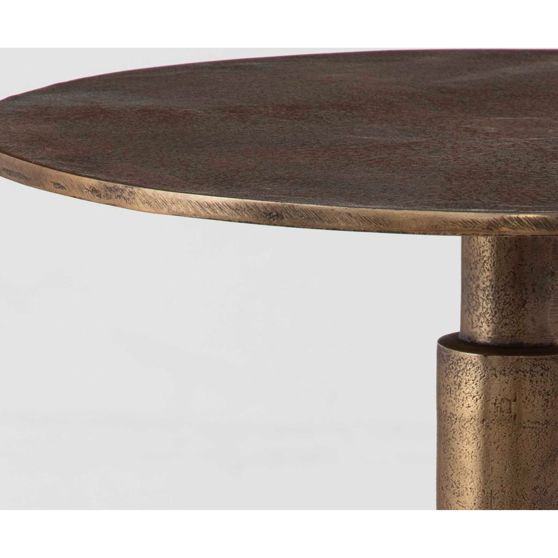 Descend Accent Table by Uttermost in gold. Made from aluminum in a modern style.