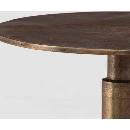 Descend Accent Table by Uttermost in gold. Made from aluminum in a modern style.