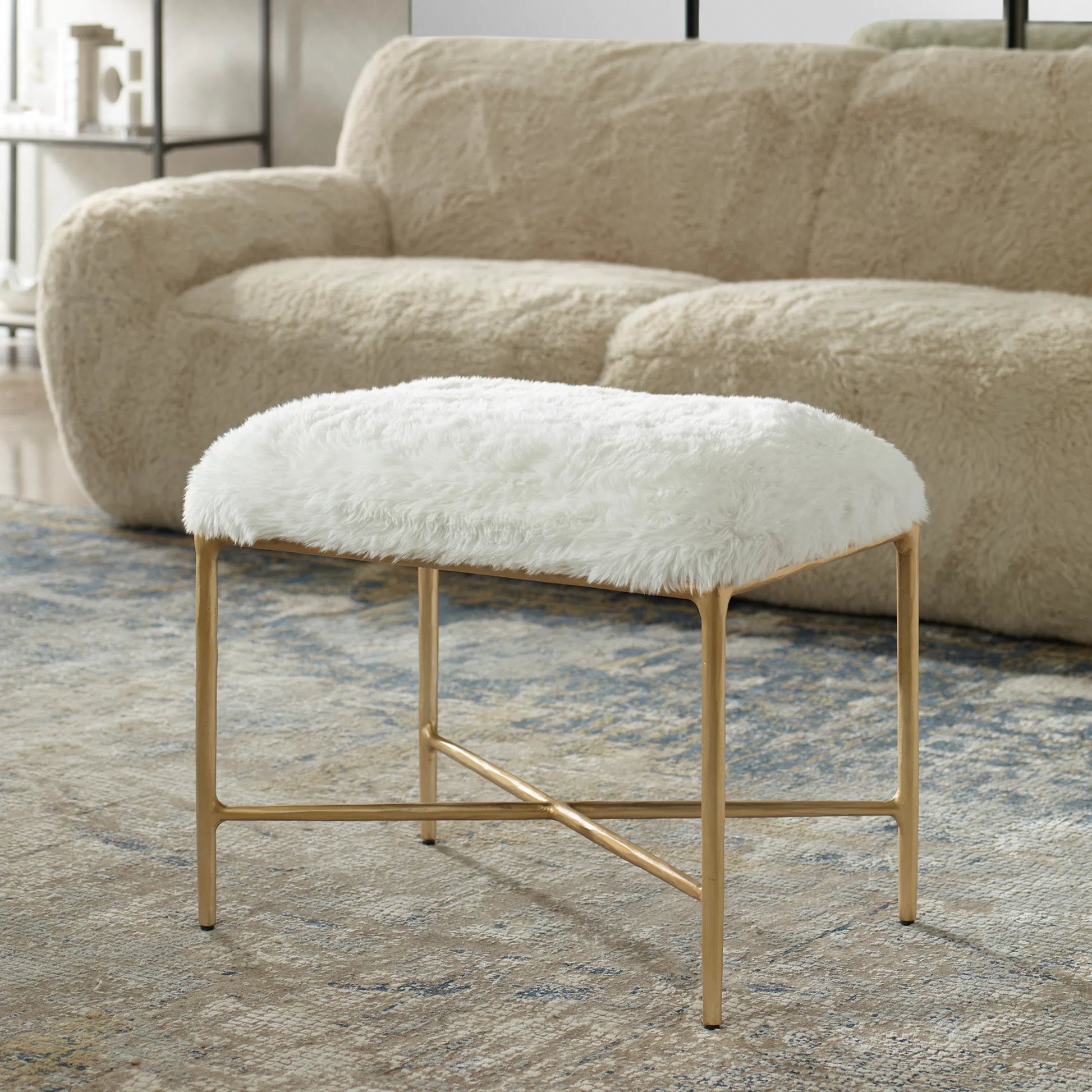 Charmed Sheepskin Bench by Uttermost in gold. Made from wrought iron, plywood, fabric, foam in a modern style.