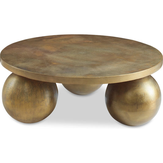 Triplet Coffee Table by Uttermost in antique brass. Made from aluminum in a modern style.