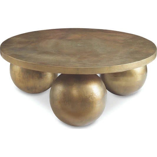 Triplet Coffee Table by Uttermost in antique brass. Made from aluminum in a modern style.