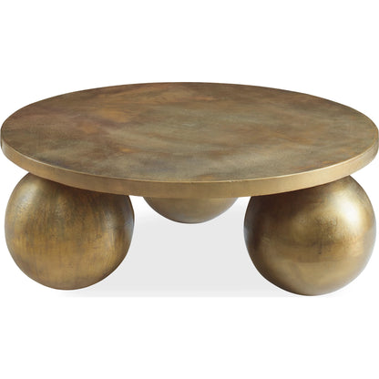 Triplet Coffee Table by Uttermost in antique brass. Made from aluminum in a modern style.
