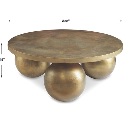 Triplet Coffee Table by Uttermost in antique brass. Made from aluminum in a modern style.