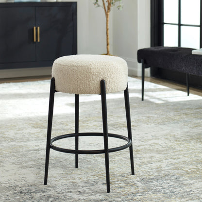 Arles Plush Counter Stool by Uttermost in white and satin black. Made from hardwood, plywood, fabric, metal, foam in a modern style.