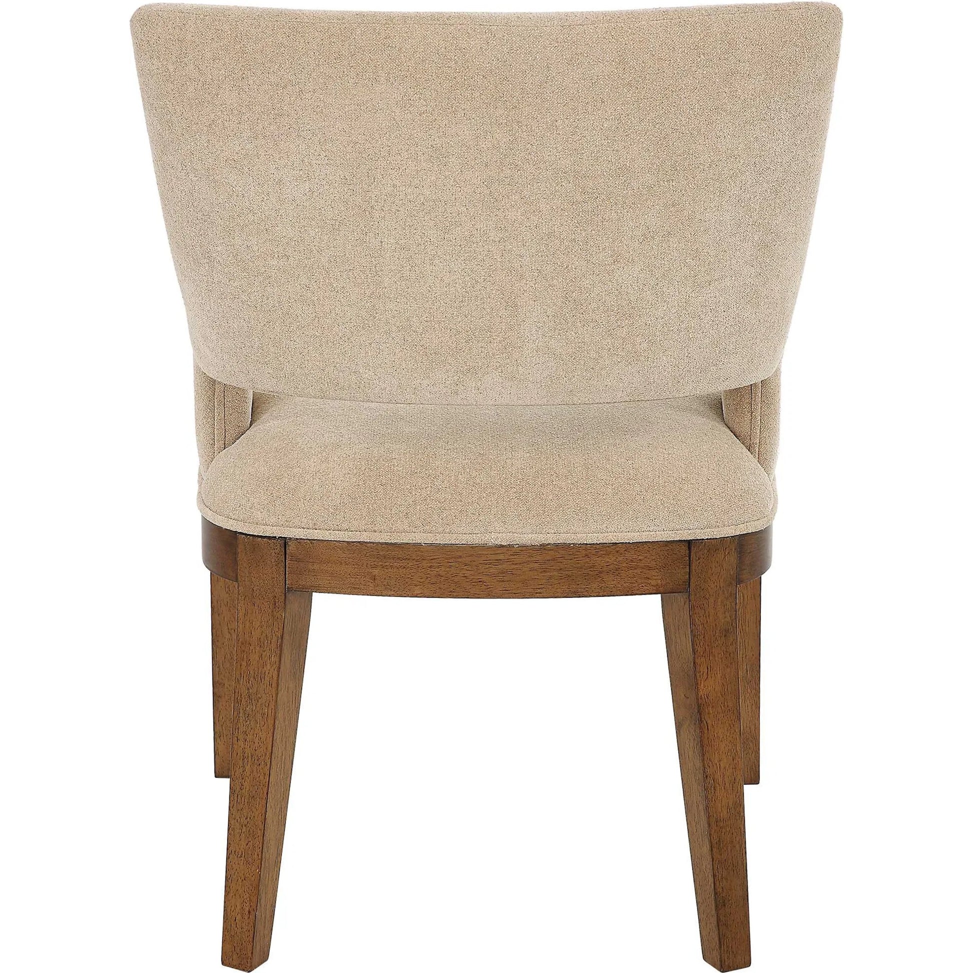 Aspect Mid-Century Dining Chair by Uttermost in wood. Made from rubber wood, plywood, fabric, foam in a transitional style.