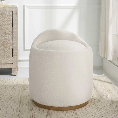 Swirl Swivel Sheepskin Ottoman by Uttermost in wood. Made from hardwood, plywood, fabric, foam in a transitional style.