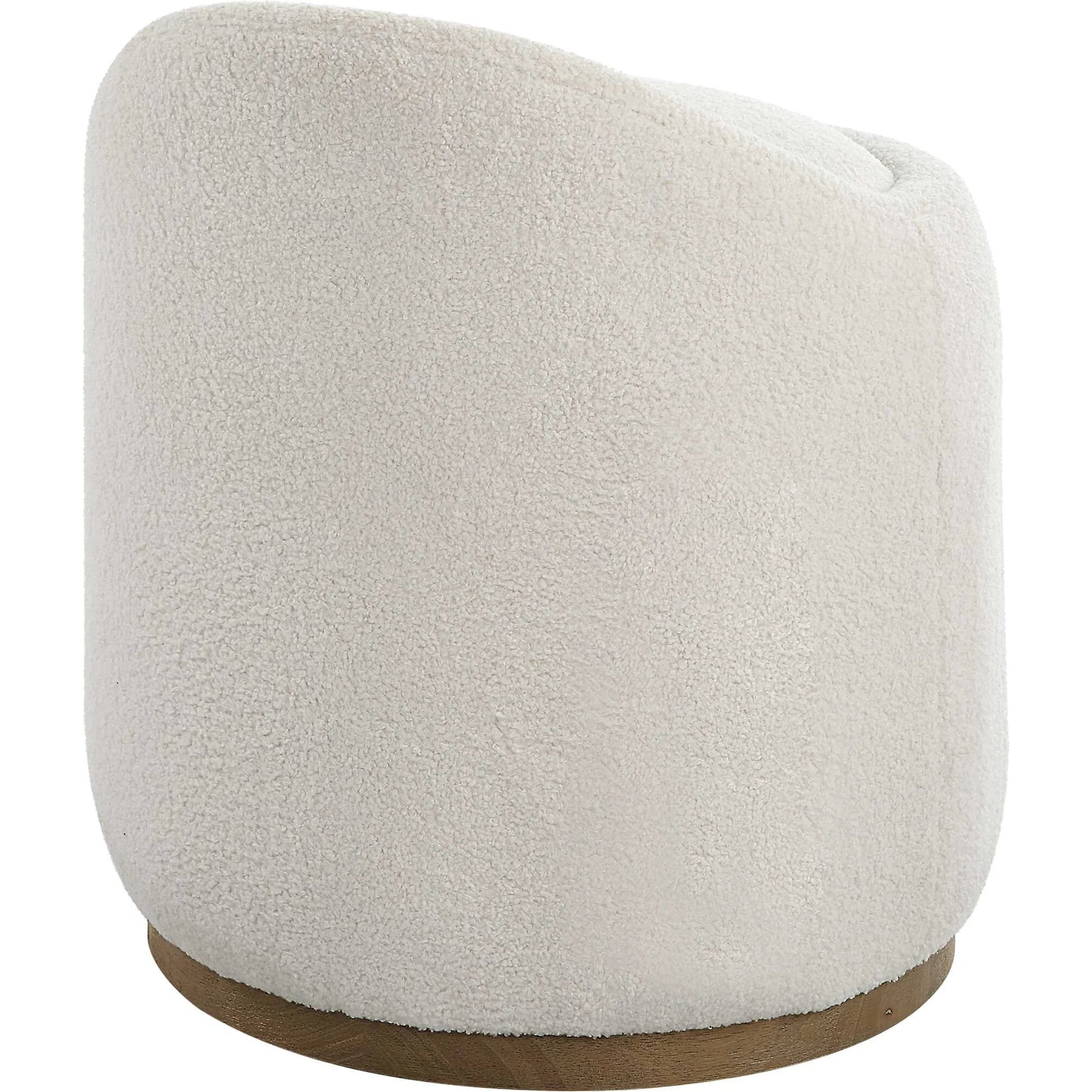 Swirl Swivel Sheepskin Ottoman by Uttermost in wood. Made from hardwood, plywood, fabric, foam in a transitional style.
