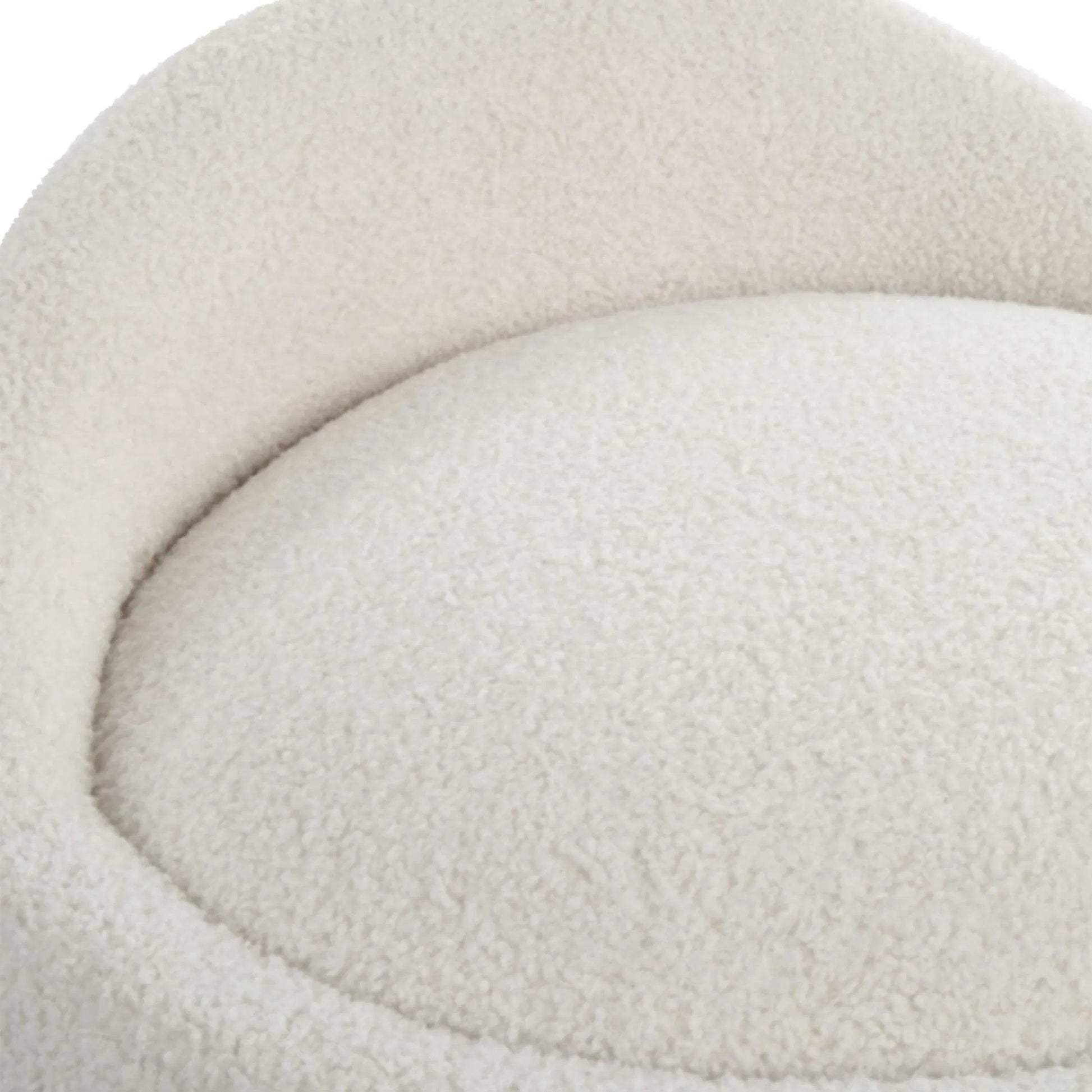 Swirl Swivel Sheepskin Ottoman by Uttermost in wood. Made from hardwood, plywood, fabric, foam in a transitional style.