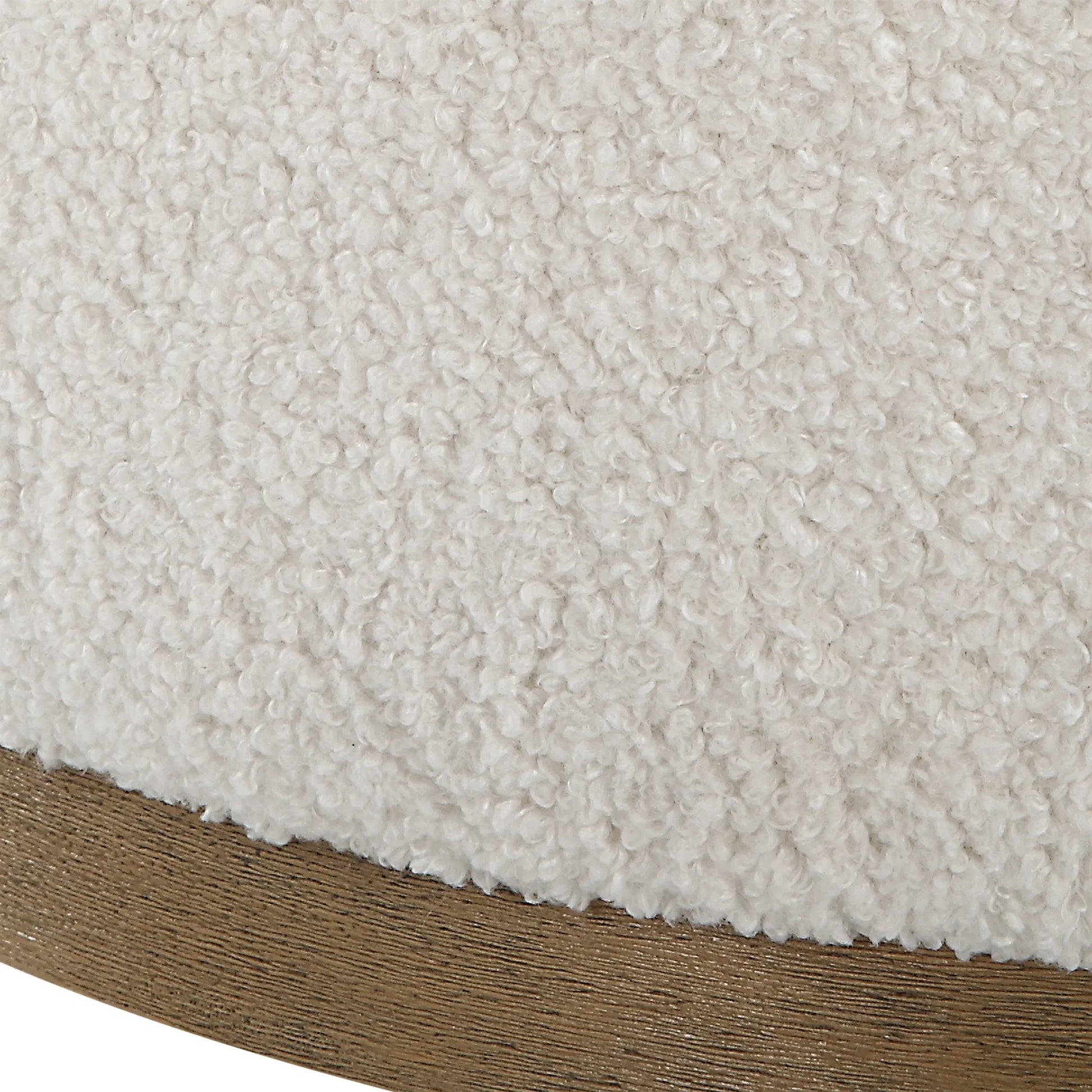 Swirl Swivel Sheepskin Ottoman by Uttermost in wood. Made from hardwood, plywood, fabric, foam in a transitional style.