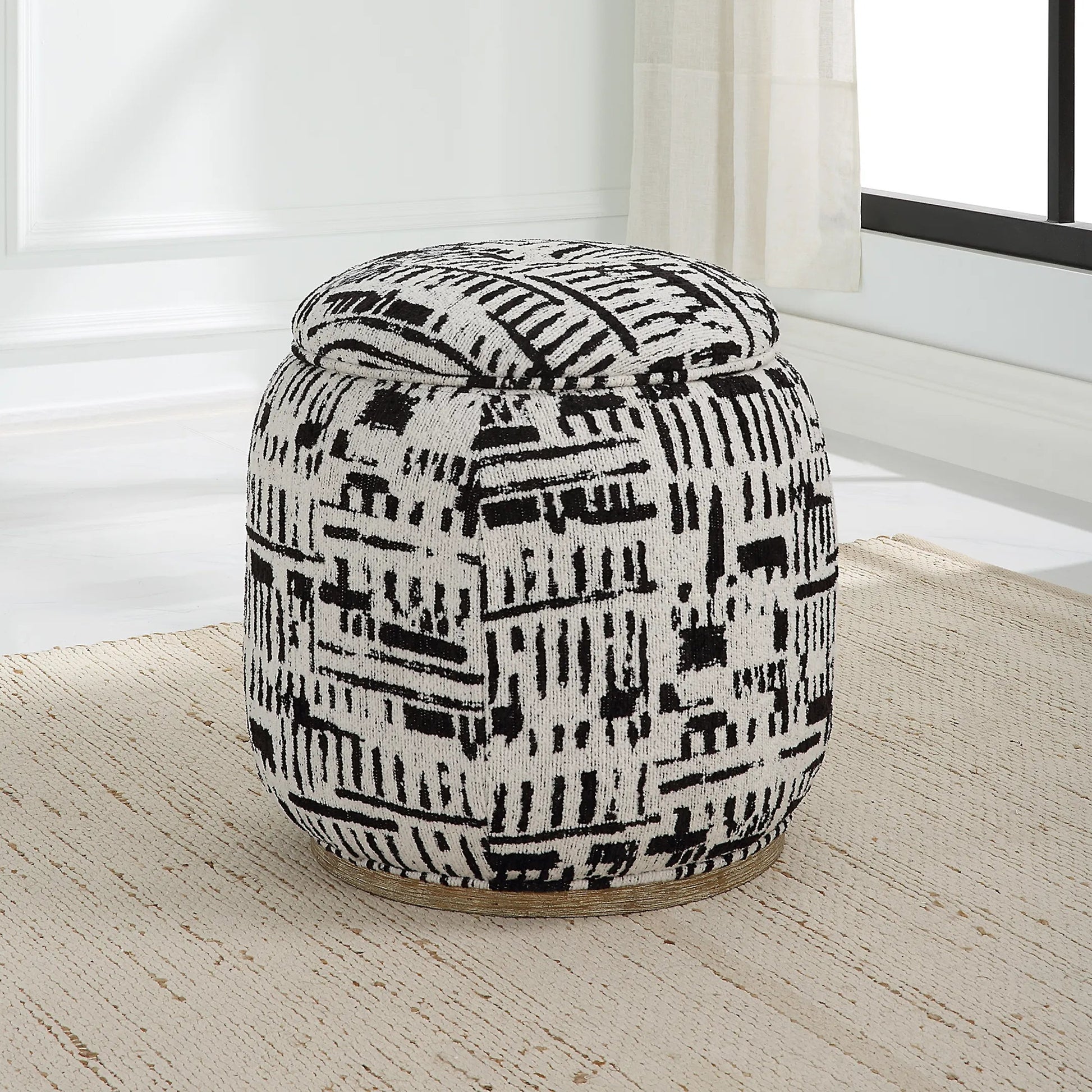 Dialogue Poof Ottoman by Uttermost in black. Made from hardwood, plywood, fabric, metal, foam in a eclectic & global style.